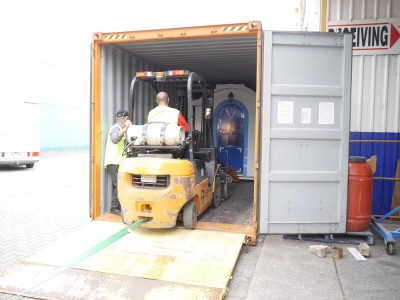 Now the hard work starts - unloading the Church from the container!